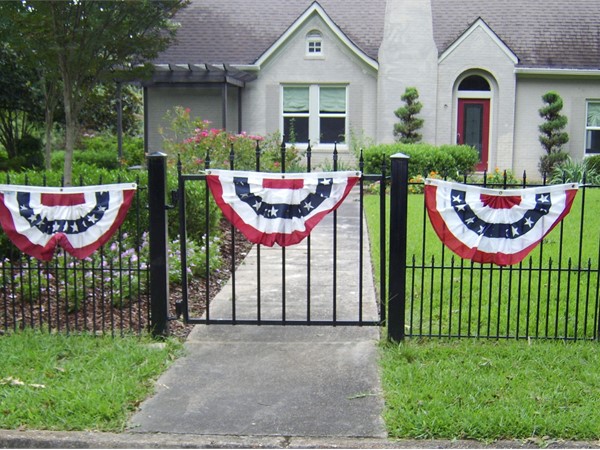 My neighbor is ready for the 4th of July with decorating their fence and yard