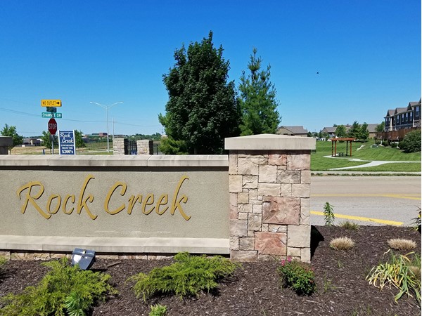 The entrance monument to Rock Creek Townhomes at 159th Street and Shawnee Drive