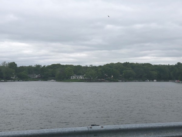 Even with a cloudy day, Lake Waukomis is gorgeous over the bridge