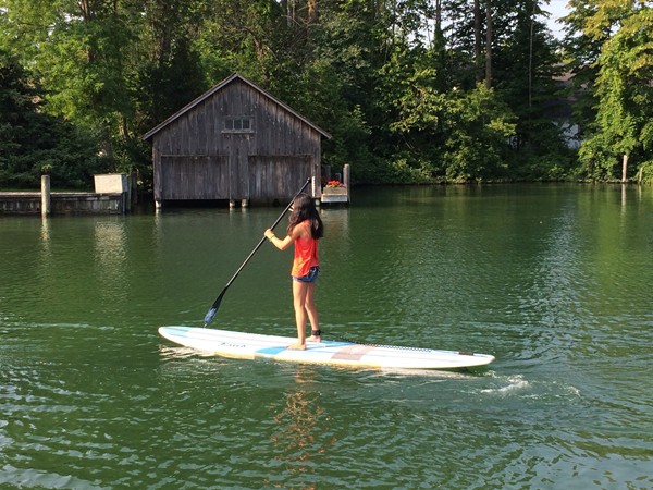 Paddle boarding on the river in Leland