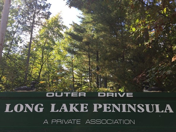 Long Lake Peninsula residents enjoy a large neighborhood park as well as a shared Long Lake beach
