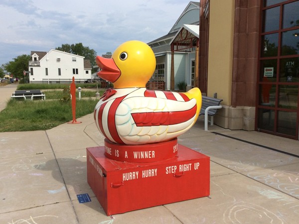 Rubber Ducky sculpture in front of Silver Beach Carousel. You would need a very large tub