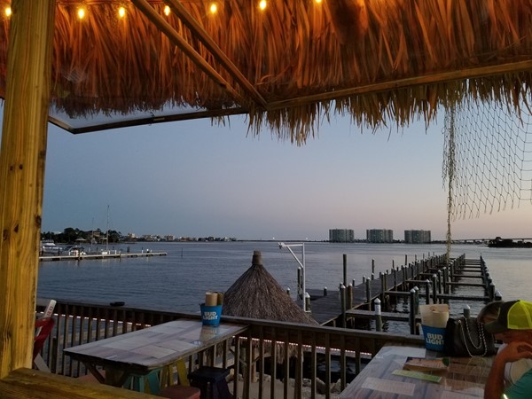 Always a view! The Caribe Resort (three towers) across the water from the Pleasure Island Tiki Bar!