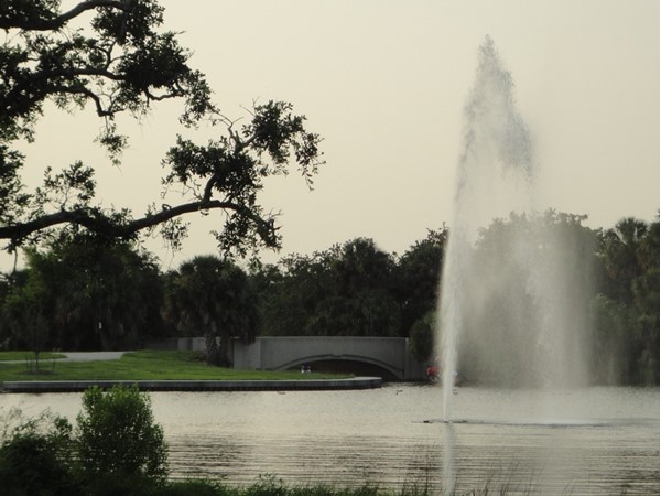 A popular walking path winds around this lake in City Park, past flower gardens and sculptures