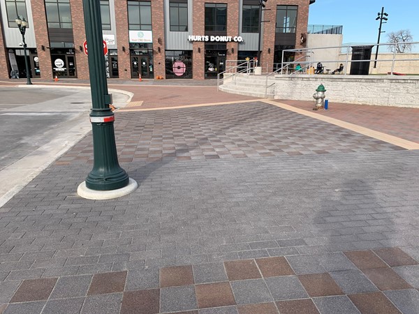 New brick sidewalks are completed at the corner of Second and State Streets in Cedar Falls