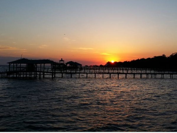 Sunset over waterfront piers on Mobile Bay, Daphne