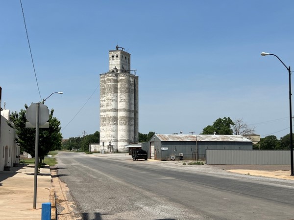 The grain elevator is a town landmark attached to the local Co-Op