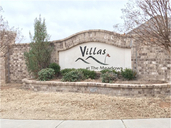 Gated community with monthly lawn care included in HOA dues and walking distance to schools