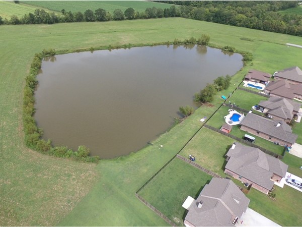 Grand Point Estates features a five acre pond for residents to enjoy