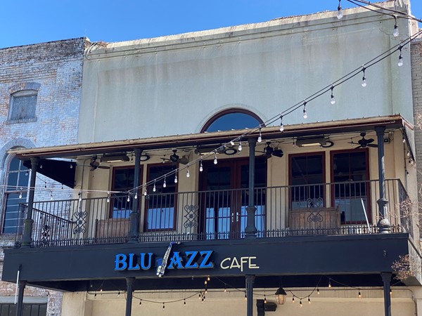 Try the Blu's Vu Du Shrimp or Redfish and enjoy the music at Blu Jazz Café