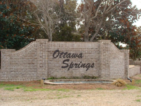 Welcome sign at Ottawa Springs - fountain operates all summer!