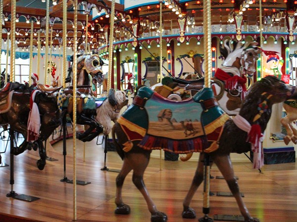 The carousel horses are waiting for riders