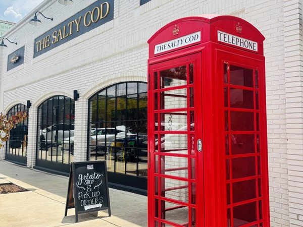 This adorable telephone booth outside The Salty Cod brings attraction. It is a lovely stop to make