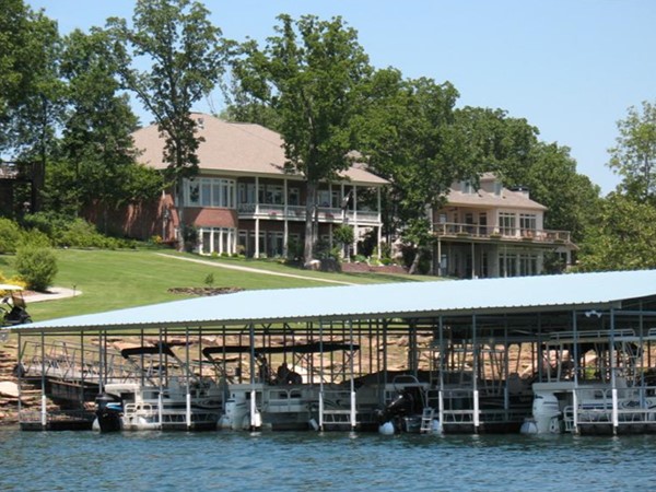 Community dock and residences in prestigious lakefront Eagle Bay Estates