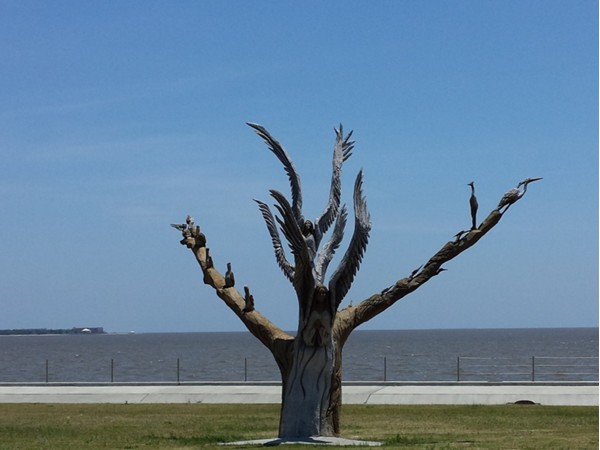 Local tree sculptures represent the resilience and passion of Bay St. Louis residents