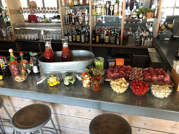 Beautiful Bloody Mary bar at Little Fleet. Sunday brunch with the family in Boardman Neighborhood 
