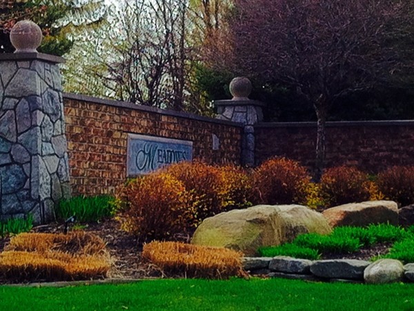The entryway of the Meadows of Grand Blanc in early spring