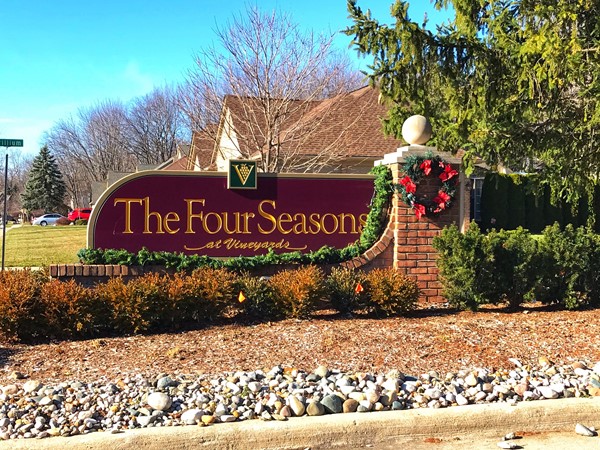 Entrance for The Four Seasons at Vineyards with single family homes