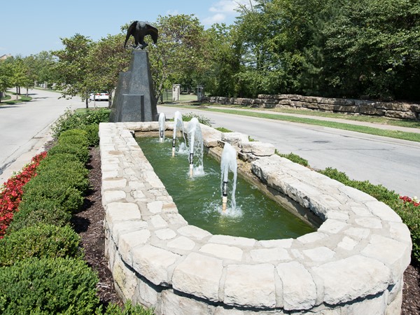 Water and sculpture monument at Falcon Valley entrance