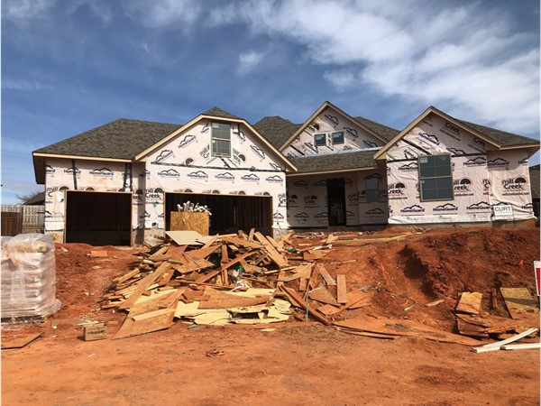 New home under construction in Belmont Farms