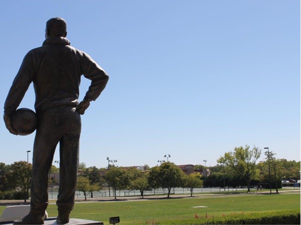 Sculpture of James Naismith overlooks the KU campus