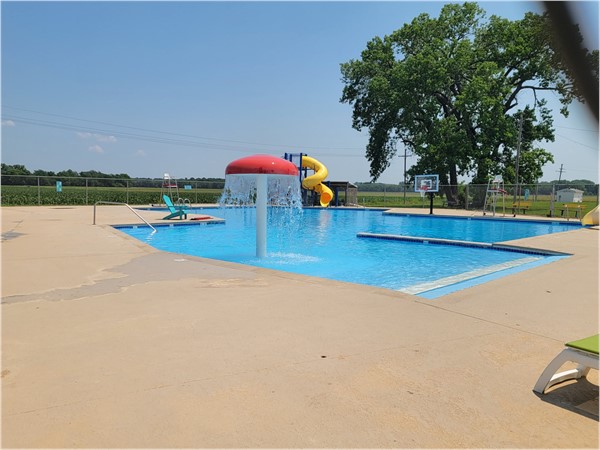 Get cooled off at the pool! Just look at that fun slide