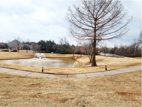 Beautiful stocked pond and walking trail at Timber Ridge Point