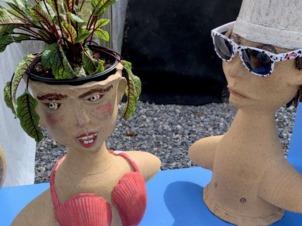 Fun beach lover's planters displayed at the Orange Beach Festival of Art 2020