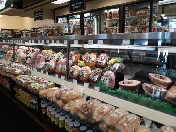 Large selection of lunch meat at the deli counter