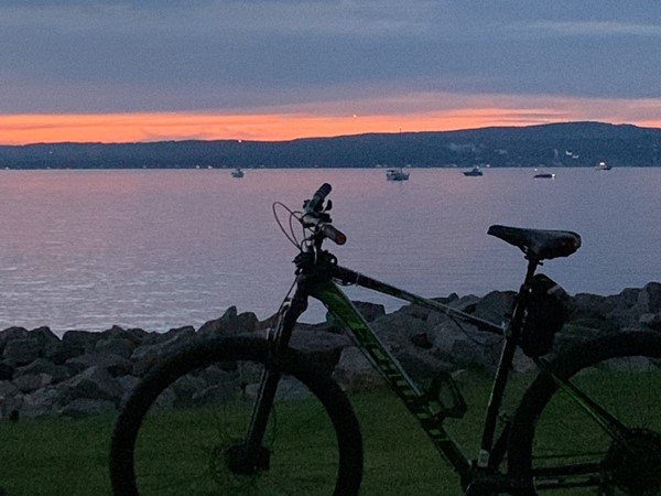 Glorious sunset looking from Petoskey towards Harbor Springs. The bike trail brings us together!