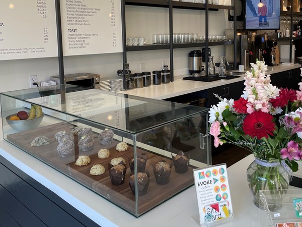 Café Evoke's modern coffee shop in Edmond offers fresh pastries and a variety of coffee drinks