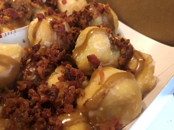 You haven’t lived unless you’ve tried the Maple Bacon Donut Holes from Cajun Market Donut Co