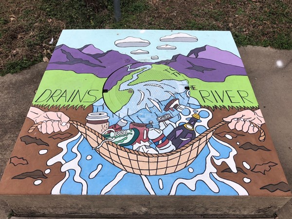 Art work on storm drain in downtown Fort Smith 