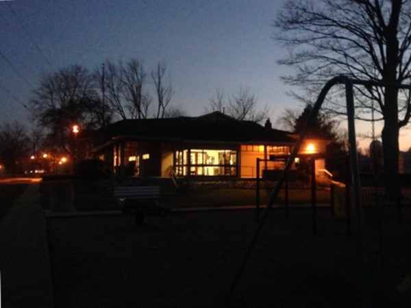 Although it is getting dark earlier, the lights are still on at the public library in Coopersville