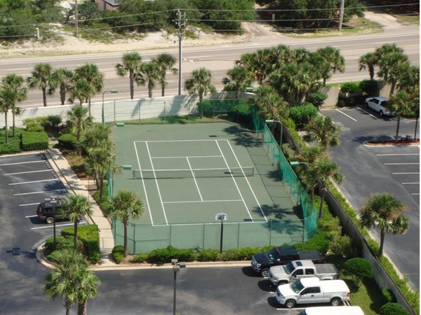 Play a game of tennis or basketball while staying at Pelican Pointe in Orange Beach