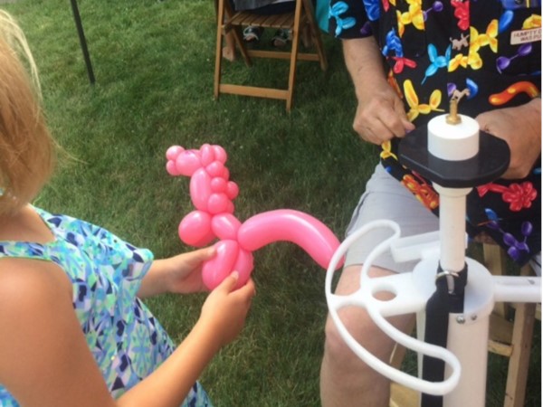 Having fun with the Balloon Guy at Covered Bridge Days