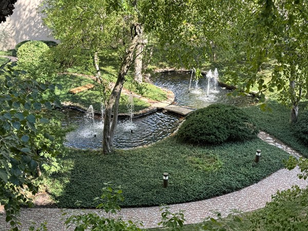 View of the garden pond and fountains at Santa Fe Place Condos