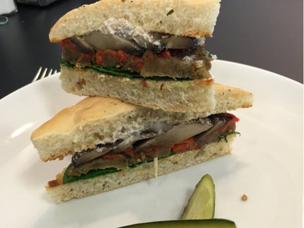 Portobello Mushroom Sandwich with homemade bread, mayo and pickles at Cafe Bonjour