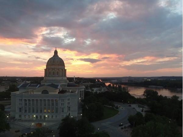 A June sunset casted its beautiful reflection onto the Capital building and the Missouri River 
