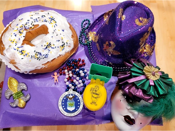 Mardi Gras fun consists of special beads, masks, and yummy King Cake